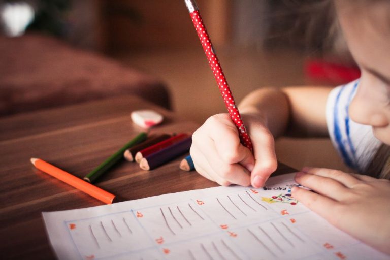 A primary school pupil working.