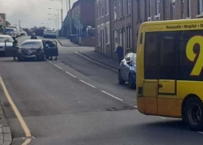 Bus and car collide